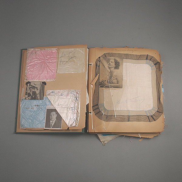 Celebrity Autograph Handkerchief Scrapbook,: Celebrity Autograph Handkerchief Scrapbook, containing approximately one hundred handkerchiefs from the 1930's, including an autograph from Shirley Temple {Dimensions of book 14 1/2 x 12 inches}