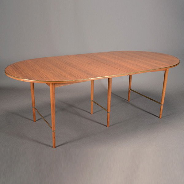 Paul McCobb for Directional Table.: Paul McCobb for Directional Table. With delicate brass edging and stretchers. Measures approximately 79 inches in length, 49 inches in width, 29 1/4 inches in height. One leaf has been glued into the 
