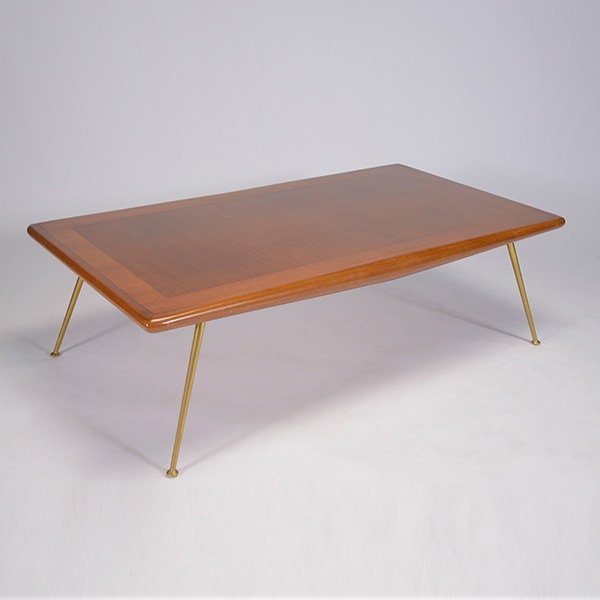 T.H. Robsjohn-Gibbings for Witticomb Coffee Table.: T.H. Robsjohn-Gibbings for Witticomb Coffee Table. With tapered saber legs of solid brass, original finish.