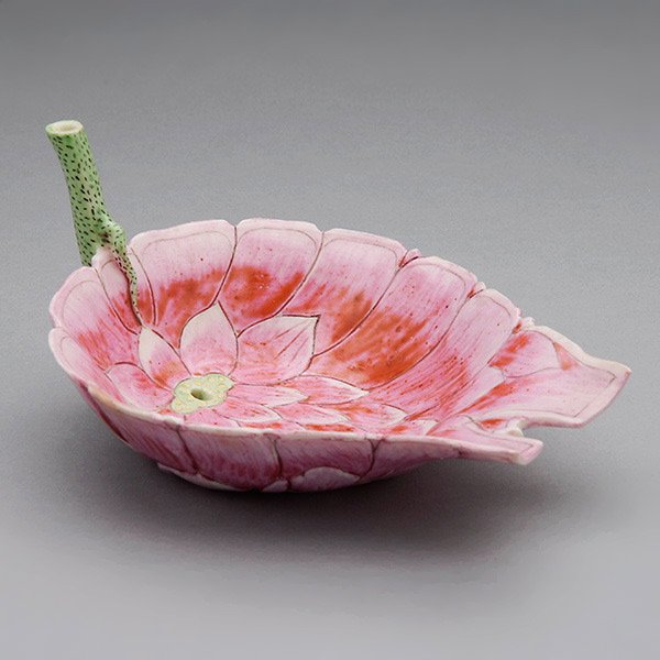 A Famille Rose Lotus-Form Libation Cup: A Famille Rose Lotus-Form Libation Cup, The deep rounded well molded in the likeness of a large lotus flower, shaped overlapping petals of deep pink glaze fading to white at the tips, the green speckl