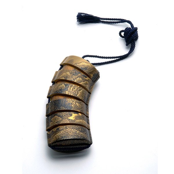 A Lacquer Inro, Edo Period, Signed Gyokkosai: A Lacquer Inro, Decorated in brilliant gilt to depict a majestic mountainous landscape. Edo Period, Signed Gyokkosai, Length: 3 3/8 inches (8.6 cm) [Minor wear to the gilding. This condition report st