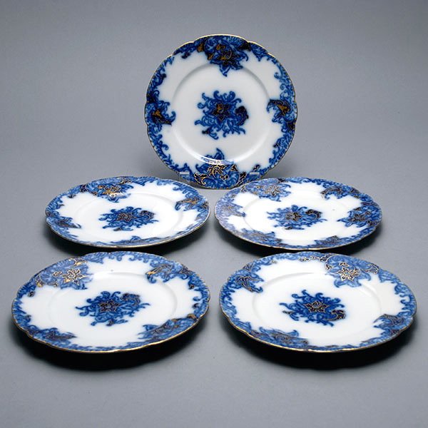 Ten Limoges Flow Blue Dessert Plates: Ten Jean Pouyat Limoges Flow Blue Dessert Plates with Gilt Highlights {Diameter 7 3/8 inches} Sold to benefit HIP Housing in San Mateo, California. For additional information refer to page 1.