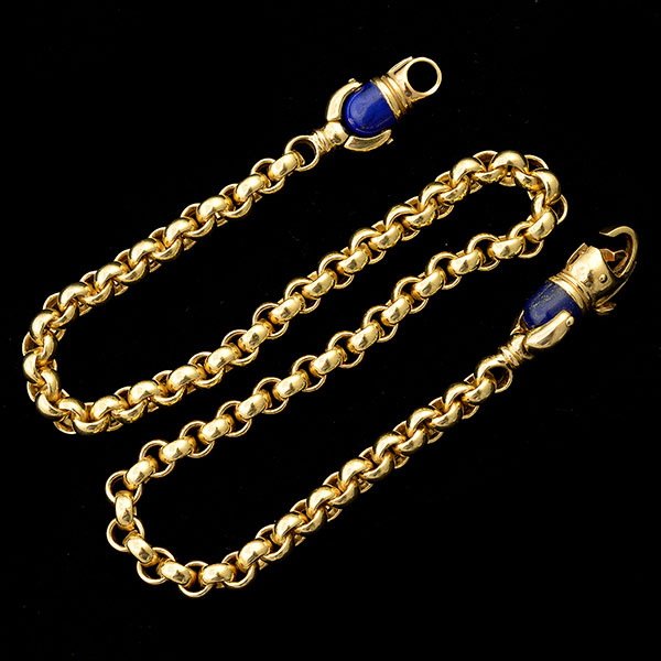 LAPIS LAZULI, CARNELIAN, 18K YELLOW GOLD NECKLACE.: LAPIS LAZULI, CARNELIAN, 18K YELLOW GOLD NECKLACE. The 18k yellow gold 18.00 mm open link, each end terminates in lapis lazuli bullet cabochon swivel link, completed by a carnelian pressure lock lobst