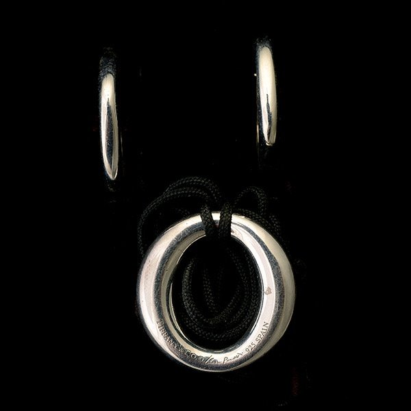 TIFFANY & CO. STERLING SILVER JEWELRY SUITE.: TIFFANY & CO. STERLING SILVER JEWELRY SUITE. Including one pair of Tiffany and Co. sterling silver hoops measuring approximately 22 mm together with one Elsa Perretti Tiffany and Co. sterling silver "