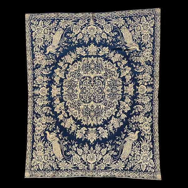 Blue and White Coverlet with peacocks