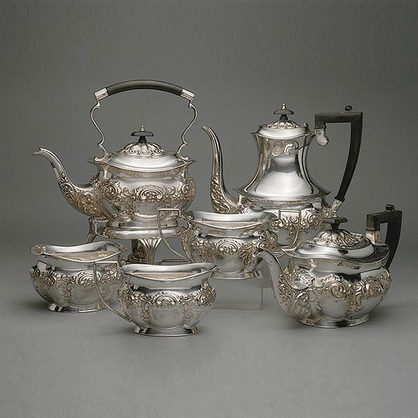 Sheffield Plate Six Piece Coffee and Tea Service:: Sheffield Plate Six Piece Coffee and Tea Service: Including kettle on stand; coffee pot; teapot; sugar; creamer; and splat {Height of kettle on stand 12 inches; height of coffee pot 9 inches}