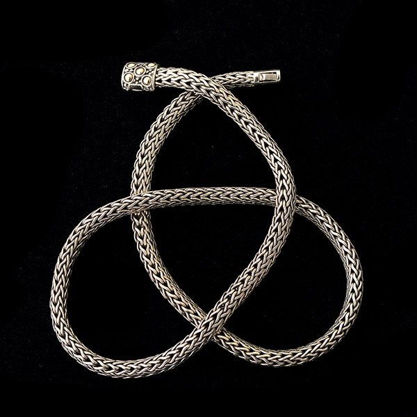 JOHN HARDY STERLING SILVER, 18K GOLD NECKLACE.: JOHN HARDY STERLING SILVER, 18K YELLOW GOLD NECKLACE. The sterling silver woven link measuring approximately 4.5 mm in width, completed by an Asian tube clasp, accented by 18k yellow gold, forming an