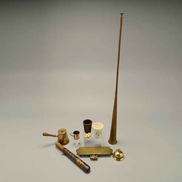 Group of 19th C English Gentleman's Accouterments:: Assembled Group of 19th Century English Gentleman's and Gaming Accouterments: a copper brass banded coach horn {length 38 inches}; a copper half gill spirit measure; a brass brandy warmer; a "Johnny W