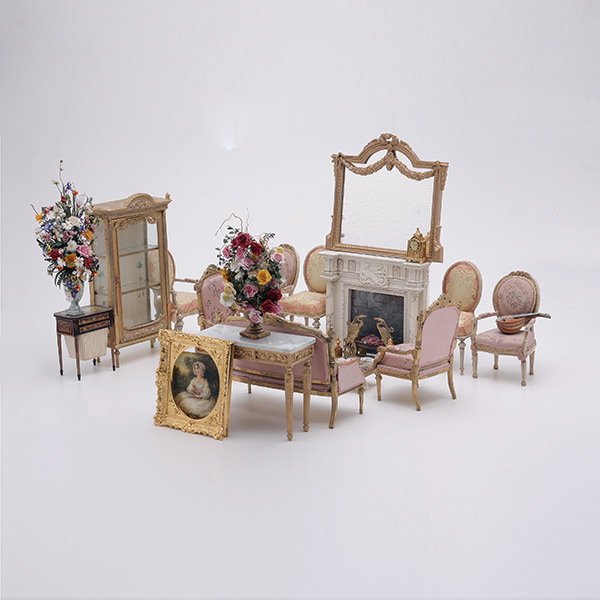 Collection of French Style Doll House Furniture:: Collection of French Neoclassical Style Doll House Furniture: Comprising pair suite with sofa and two chairs; two sets of chairs; fireplace surround; console table; display case; sewing table; floral 