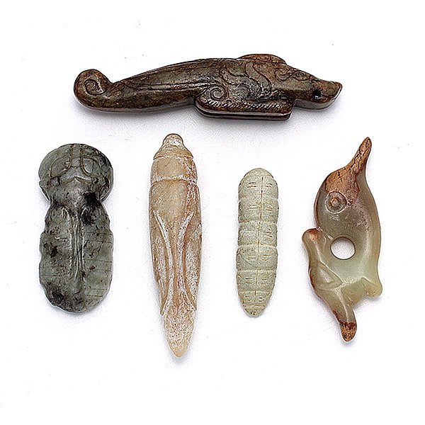 Five Jade Carvings, Neolithic to Han Dynasty: Five Jade Carvings, Comprising two cicada-form pendants, a cocoon-form pendant, and two dragon-form carvings. Neolithic to Han Dynasty, Longest: 3 7/8 inches (9.8 cm) [Wear, minor losses. This conditi