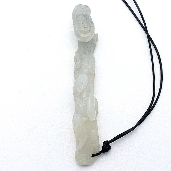 A Small Jade Belt Hook, Qing Dynasty: A Small Jade Belt Hook, Carved in the form of a ruyi scepter bearing lingzhi fungus heads. Qing Dynasty, Length: 3 inches (7.6 cm)