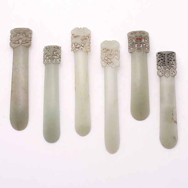 Six Jade Hairpins, Qing Dynasty: Six Jade Hairpins, Each of curving spatulate form with a flat finial reticulated decorations. Qing Dynasty, Length: 4 3/8 inches (11.1 cm) [Chips. This condition report states major condition issues o
