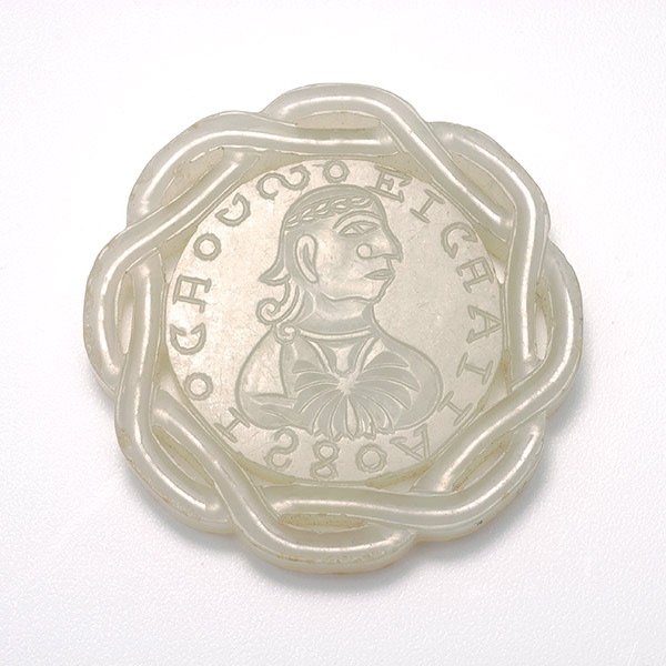 A Circular Jade Plaque, Qing Dynasty: A Circular Jade Plaque, Carved in the likeness of an ancient Roman coin with a braided outer border. Qing Dynasty, Diameter: 2 inches (5.1 cm) [Chips. This condition report states major condition issu