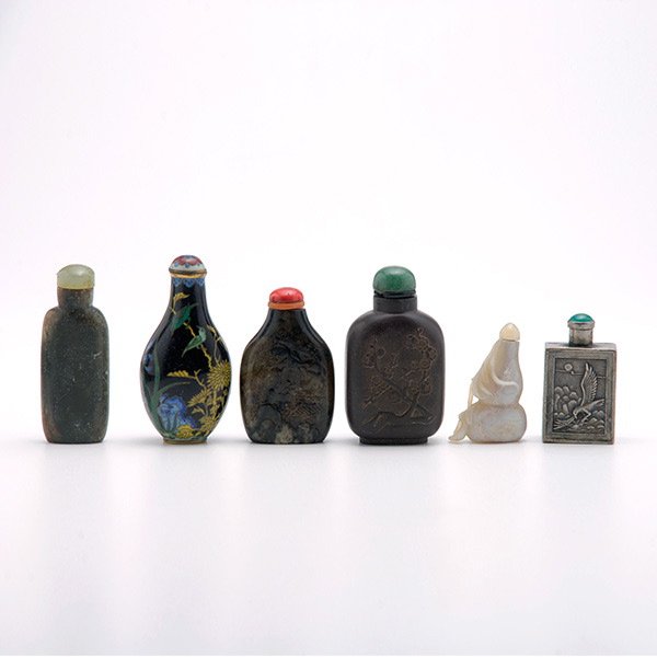Six Snuff Bottles, Late Qing Dynasty: Six Snuff Bottles, Comprising a silver, chalcedony, duan stone, cloisonnÃ© enamel and two serpentine stone, of various shapes and decorations. Late Qing Dynasty, Tallest: 3 inches (7.6 cm) overall [