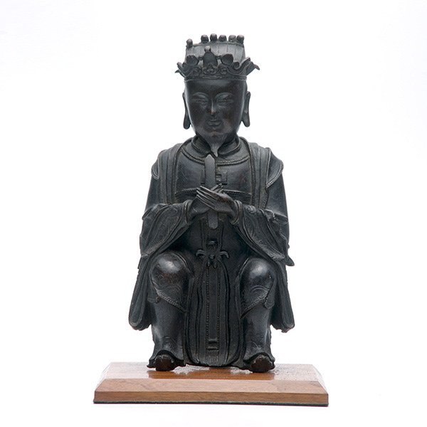 A Bronze Figure of a Scholar, Ming Dynasty, 17th C.: A Bronze Figure of a Scholar, Cast as a robed scholar seated holding a tablet in his clasped hands. Ming Dynasty, 17th Century, Height: 12 1/8 inches (30.8 cm) [Overall wear, losses, dents. This condi