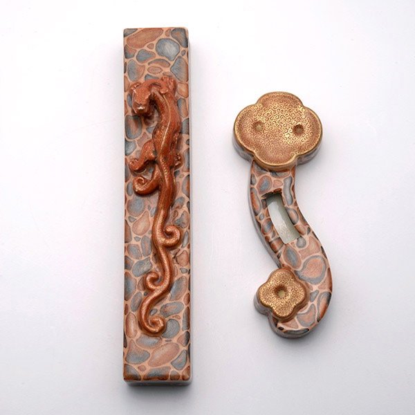 Two Faux Puddingstone Porcelain Desktop Items: Two Faux Puddingstone Porcelain Desktop Items, Qianlong Marks, the first a paperweight featuring a chilong dragon; the second a ruyi-shaped inkwell; both with a six-character mark on the base {Longest