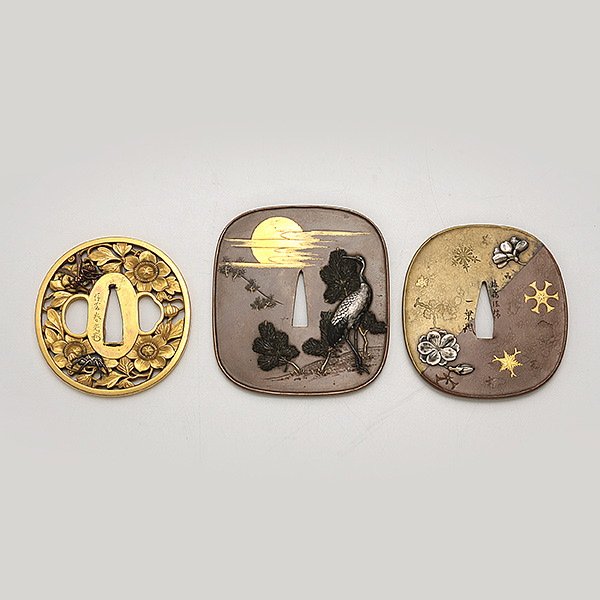 Three Japanese Tsubas: Three Japanese Tsubas, decorated with either birds, flowers or insects to both sides, each signed {Height: 3 1/2 inches (8.9 cm)} [Abrasions, small nicks and dents]