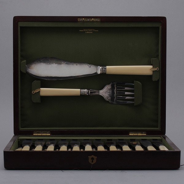 Edwardian Sheffield Bone Handled Cased Fish Set: Edwardian Sheffield Bone Handled Cased Fish Service: Comprising twelve forks and twelve knives {length 8 1/2 inches}; serving fork and knife {length 12 inches} (26)