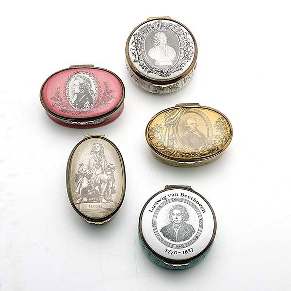 5 Cartier Bilston & Battersea Enameled Pill Boxes,: Five Cartier Bilston & Battersea Enameled Pill Boxes, picturing musicians {Length of longest 2 3/4 inches} [one with dislocated mount]