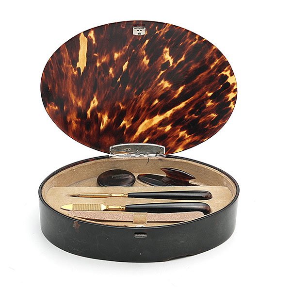 English Tortoise Shell Oval Dresser Box: English Tortoise Shell Oval Dresser Box Fitted with Manicure Implements {Height 1 1/2 inches; length 7 1/4 inches} [small loss bottom edge]