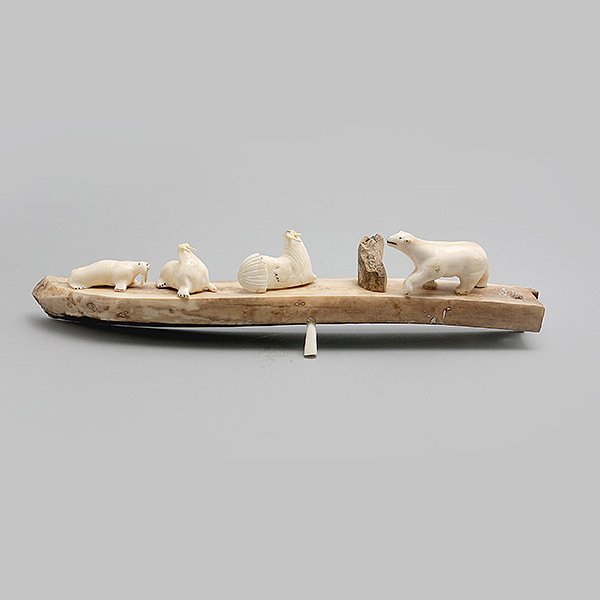 Inuit Bone Carving: Inuit Bone Carving Depicting Seals and a Bear on an Ice Bridge {Length 13 1/4 inches} [small losses]