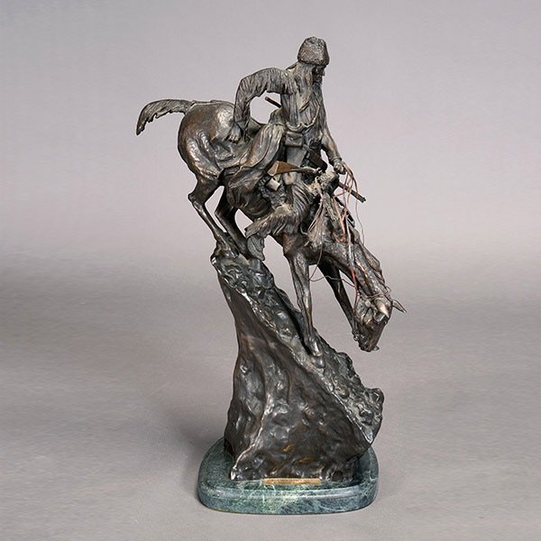 After Frederic Remington, The Mountain Man: After Frederic Remington (American 1861-1909) , The Mountain Man, inscribed copyright Fredric Remington {Height on base 29 1/2 inches}