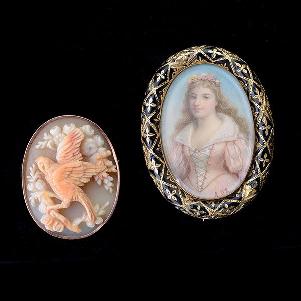 COLLECTION OF THREE BROOCHES.: COLLECTION OF THREE PAINTED PORTRAIT, ENAMEL, SHELL CAMEO, 14K YELLOW GOLD BROOCHES. Including one painted portrait of a maiden, set in an enamel accented 14k yellow gold framed mounting together with