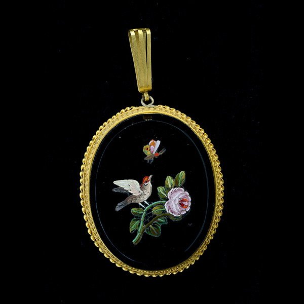 MICRO MOSAIC 18K YELLOW GOLD LOCKET-PENDANT.: MICRO MOSAIC 18K YELLOW GOLD LOCKET-PENDANT. The oval beveled black onyx plate features a micro mosaic of a bird on a rose branch and a butterfly in flight, set in an 18k yellow gold twist motif frame