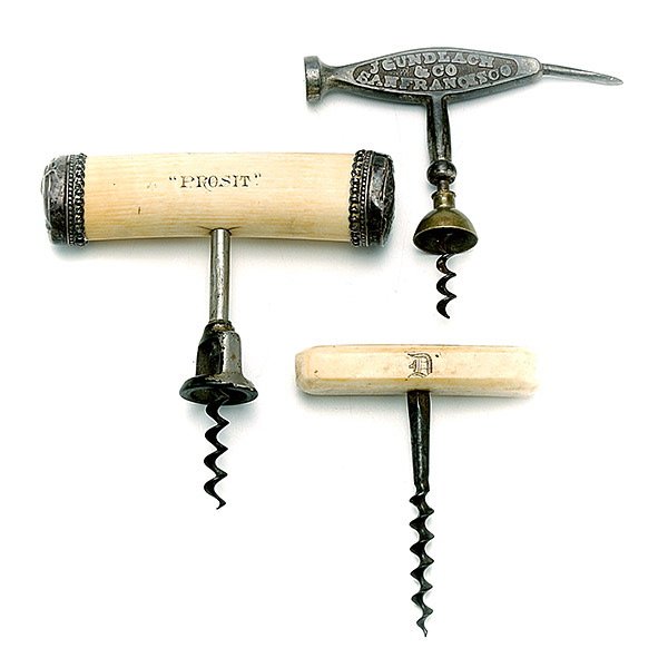 Three Vintage Wine Bottle Openers: Three Vintage Wine Bottle Openers, including two ivory, one with sterling mounts; and the third by Gundlach San Francisco {Length of longest handle 5 1/2 inches}