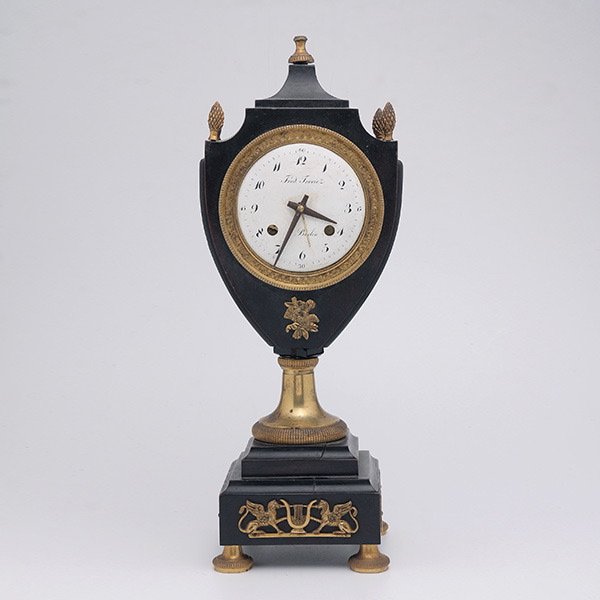 German Gilt and Ebonized Mantle Clock,: German Gilt and Ebonized Bronze Urn Form Mantle Clock, Fred Traviez, Berlin, First Half 19th Century {Height 15 3/4 inches} [small losses, break to one finial]