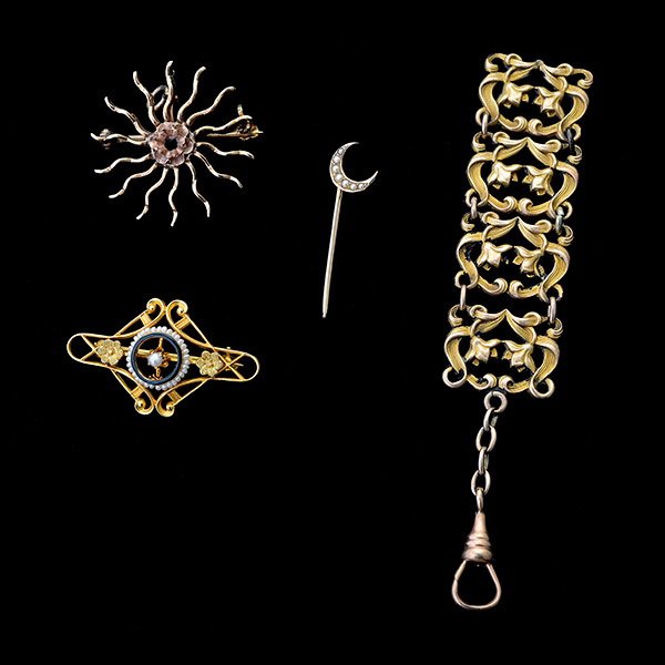 Collection of Yellow Gold Jewelry Items.: Collection of Yellow Gold Jewelry Items. Including one Art Nouveau 14k yellow gold floral link chain fob; one 14k yellow gold sun ray brooch; one Riker pearl, 14k yellow gold crescent stickpin togethe