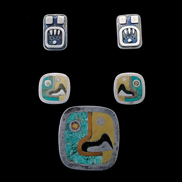 Inlaid Mexican Silver, Mixed Metal Jewelry.: Collection of Inlaid Mexican Sterling Silver, Silver, Mixed Metal Jewelry. Including a matching pair of earrings and brooch by Los Castillo of inlaid stone and mixed metals of a parrot's head together
