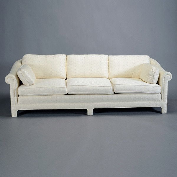 Dunbar Sofa by Edward Wormley: Dunbar Sofa by Edward Wormley. With ivory patterned upholstery, complete with loose back pillows. L: 90inches, D: 37 inches H: 30 inches.