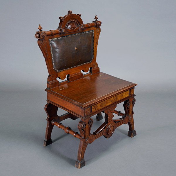 Renaissance Revival Hall Chair: Renaissance Revival Walnut Hall Chair, with lift seat and leather back {Dimensions 40 x 27 x 16 3/4 inches} [losses to leather upholstery]