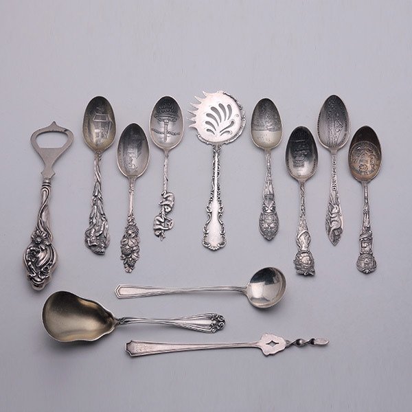Collection of Sterling Souvenir Spoons & Flatware:: Collection of Sterling Souvenir Spoons and Flatware: Comprising seven souvenir spoons; a sterling handled bottle opener {length 6 1/4 inches}; a gilt washed sugar shell; an olive spear; spoon; and a B