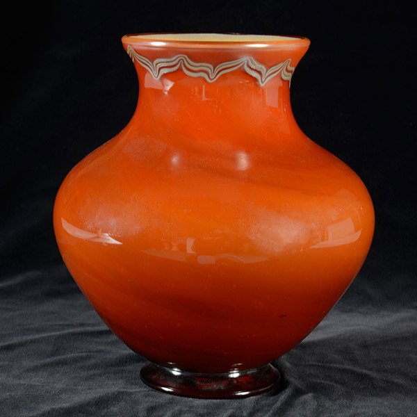 Tiffany Studios Tel el Armana Vase: Tiffany Studios Tel El Armana Vase. A large bulbous vessel executed in a reddish brown Favrile glass decorated with a wavy iridescent triple line motif just below the upper lip. Signed: 4556 G L.C. Ti