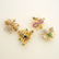 Four Multi-Stone, Diamond, Gold, Metal Brooches.