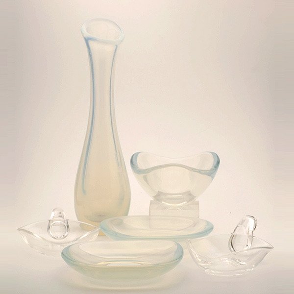 Suite of Orrefors Opalescent Glass:: Suite of Orrefors Opalescent Glass: Comprising a vase, bowl, and a suite of eight bowls; together with two Steuben bowls (12) {Height of vase 16 3/4 inches; length of Steuben bowl 8 3/4 inches}