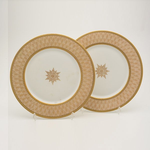 Suite of 12 Charles Martin Limoges Service Plates: Suite of Twelve Charles Martin Limoges Service Plates, with raised gilt leaf and Greek key pattern, retailed by C. Reizenstein Pittsburgh {Diameter 10 1/4 inches}