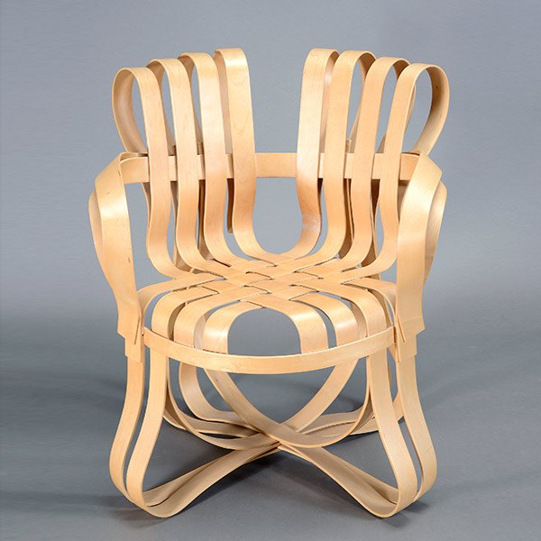 Knoll Chair Designed by Frank Gehry: Knoll Chair Designed by Frank Gehry. Some slats of wood need re-gluing onto other slats.