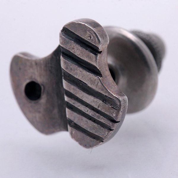 Modernist Tie Tack.: Modernist Tie Tack. The piece features a bi-level design of an abstract form, complete with original tie tack back, stamped. Peter Macchiarini. c.1960