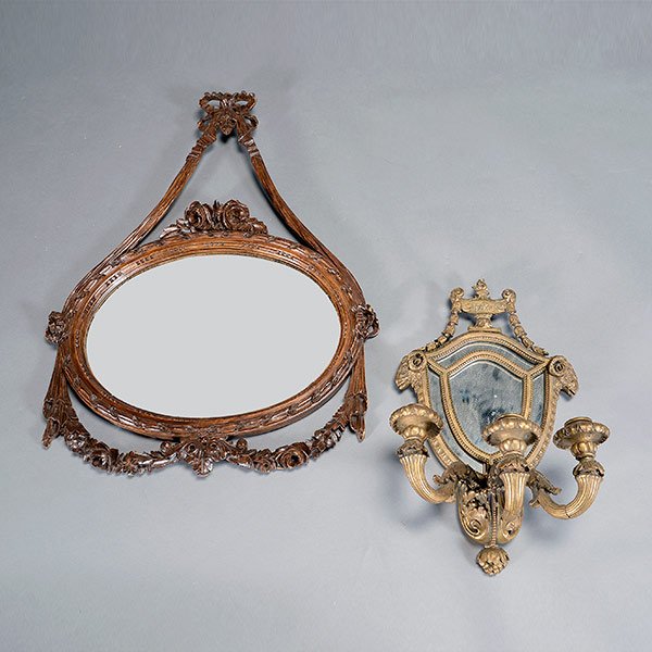 French Giltwood Sconce and Mirror: French Louis XVI Style Mirror Carved in the Form of a Ribbon-tied Oval Medallion Together With a Giltwood Three Light Sconce with Mirrored Backplate {Dimensions of giltwood sconce height 20 1/2 inches