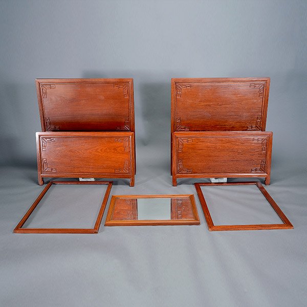 A Hardwood Bedroom Set: A Hardwood Bedroom Set, including a pair of twin headboards and footboards, one five-drawer dresser, one framed mirror and two hardwood frames {Dresser: 44 x 38 x 20 inches (112 x 97 x 51 cm)}