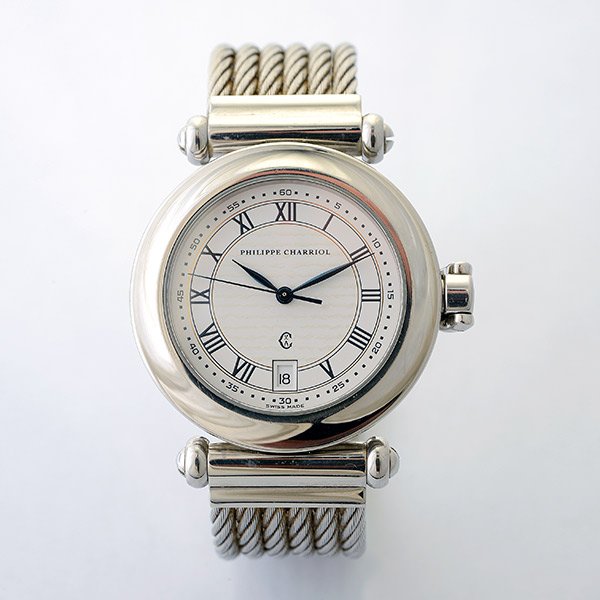 Philippe Charriol Wristwatch.: Philippe Charriol Wristwatch. DIAL: Round, wave texture white, black Roman numeral hour track, outer black dot minutes track, aperture at 6 o'clock for date, center sweep seconds hand, blued dauphine
