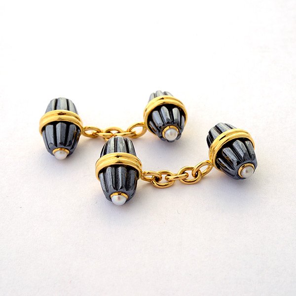 Pair of Cultured Pearl, Hematite, 18k Yellow Gold: Pair of Cultured Pearl, Hematite, 18k Yellow Gold Cufflinks. Each double sided link features a ribbed barrel hematite, accented by two half cultured pearls, set in an 18k yellow gold link. {Gross Weig