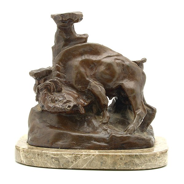 After Charles Marion Russell, Bronze of a Bison: After Charles Marion Russell (1864-1926), Bronze of a Bison, inscribed CM Russell, 1921, with a steer head mark, on marble base {Height 7 1/2 inches; length 7 1/4 inches}