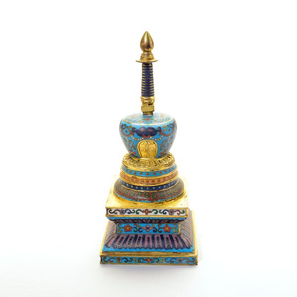 A Small CloisonnÈ Enamel Stupa: A Small CloisonnÈ Enamel Stupa The colorfully enameled tiers separated by thin gilt bands, decorated with a floral motif against a turquoise ground. {Height: 7 7/8 inches (20 cm)} [Wear to the gildin