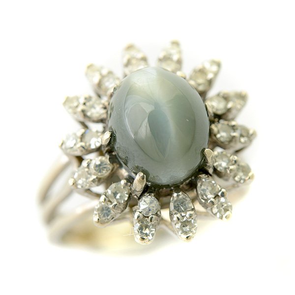 Cat's Eye Chrysoberyl, Diamond, 14k White Gold Ring.: Cat's Eye Chrysoberyl, Diamond, 14k White Gold Ring. Centering one oval cat's eye chrysoberyl measuring approximately 10 x 8 mm, surrounded by twenty-eight round-cut diamonds weighing a total of appro