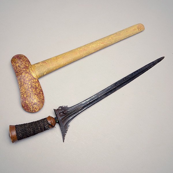 An Indonesian Dagger (Kris): An Indonesian Dagger (Kris) With a painted wood scabbard. {Length: 24 1/2 inches (62.2 cm) overall} [Corrosion, overall wear, the scabbard with abrasions, chips and small cracks]
