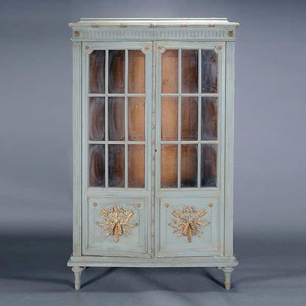 Louis XVI Style Green Painted Two Door Bookcase: Louis XVI Style Green Painted Two Door Bookcase, The upper case with an inset rectangular cornice, over a ribbon-tied fluted cornice, over a gadrooned frieze with corner rosettes, over twin glazed doo
